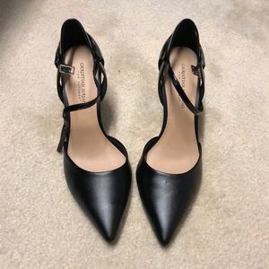 Black heels, never worn, size 11.